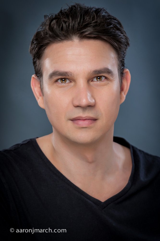 Aaron J. March