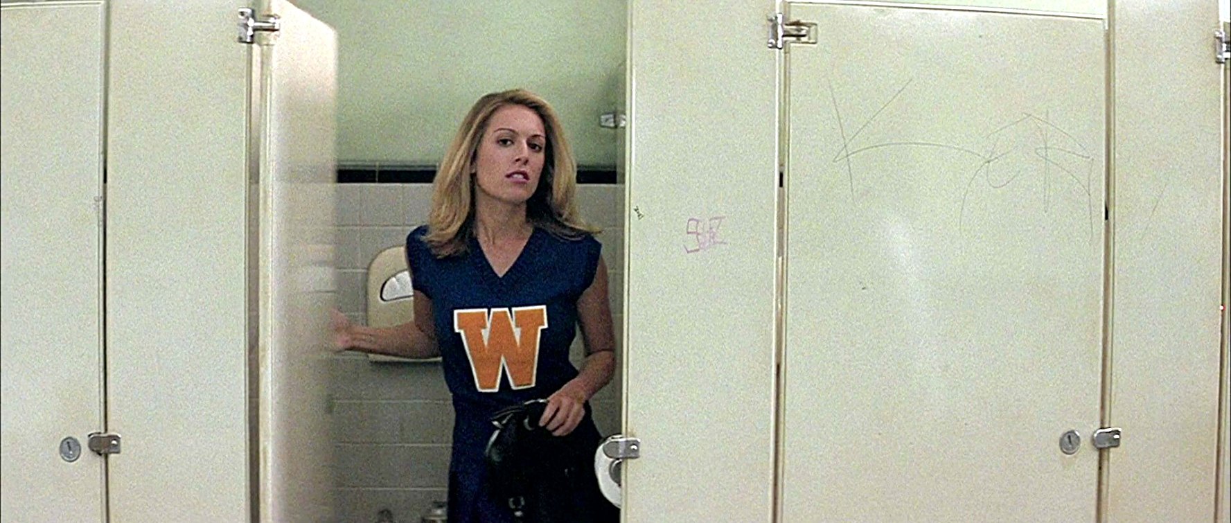 Cheerleader in Bathroom